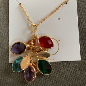 Gemstone pendant by Only One. 5 birthstone charms & 5 leaf charms. Gold chain.